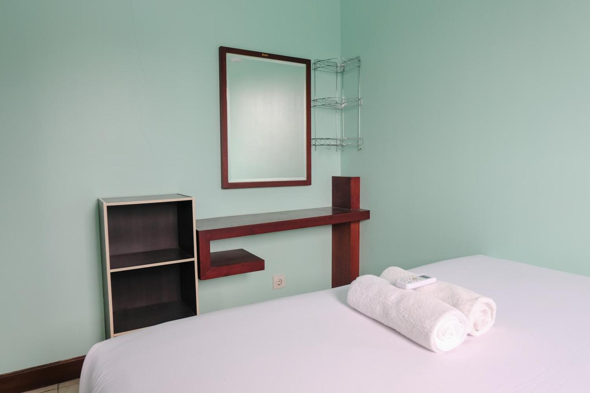 Apartemen Homey 2br At Majesty By Travelio